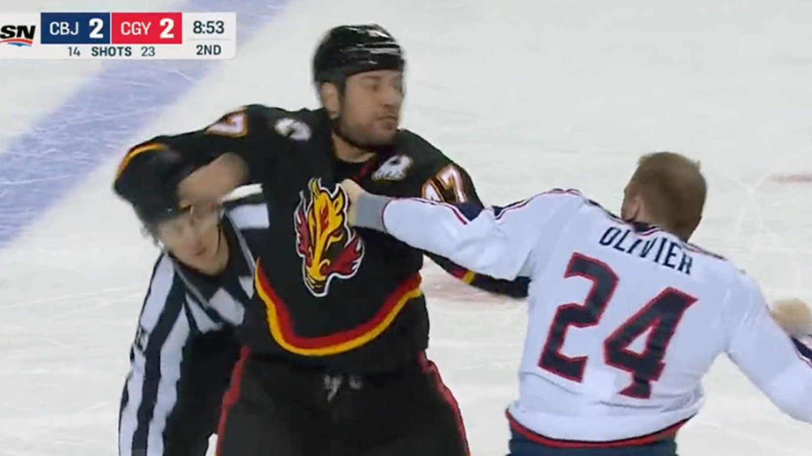Lucic and Olivier go toe to toe at center ice in the scrap of the season