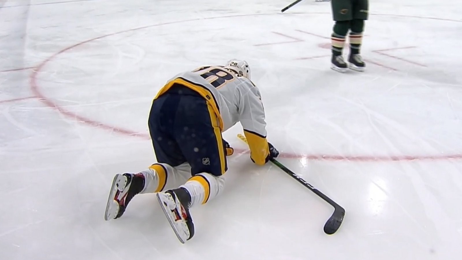 Tolvanen knocked out of the game after his head is pancaked into the boards.