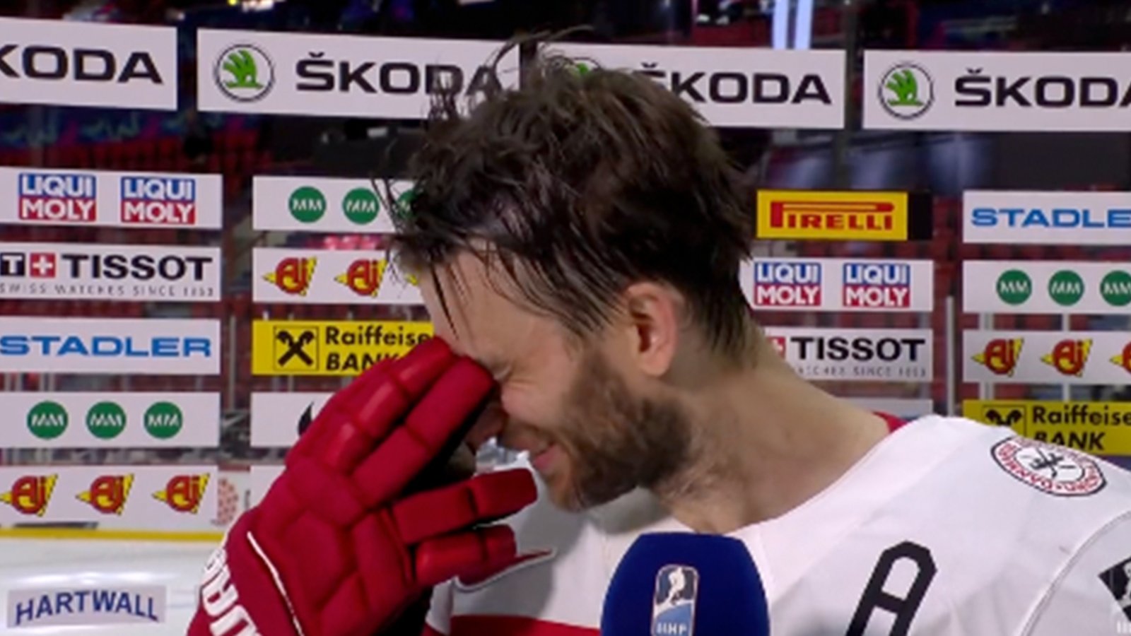 Frans Nielsen tears up as Danish fans chant his name following his final game
