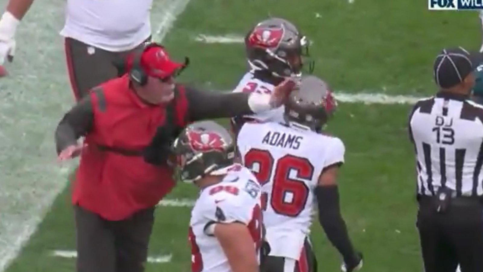 Tampa Bay HC Bruce Arians get fined for hitting one of his player on the head