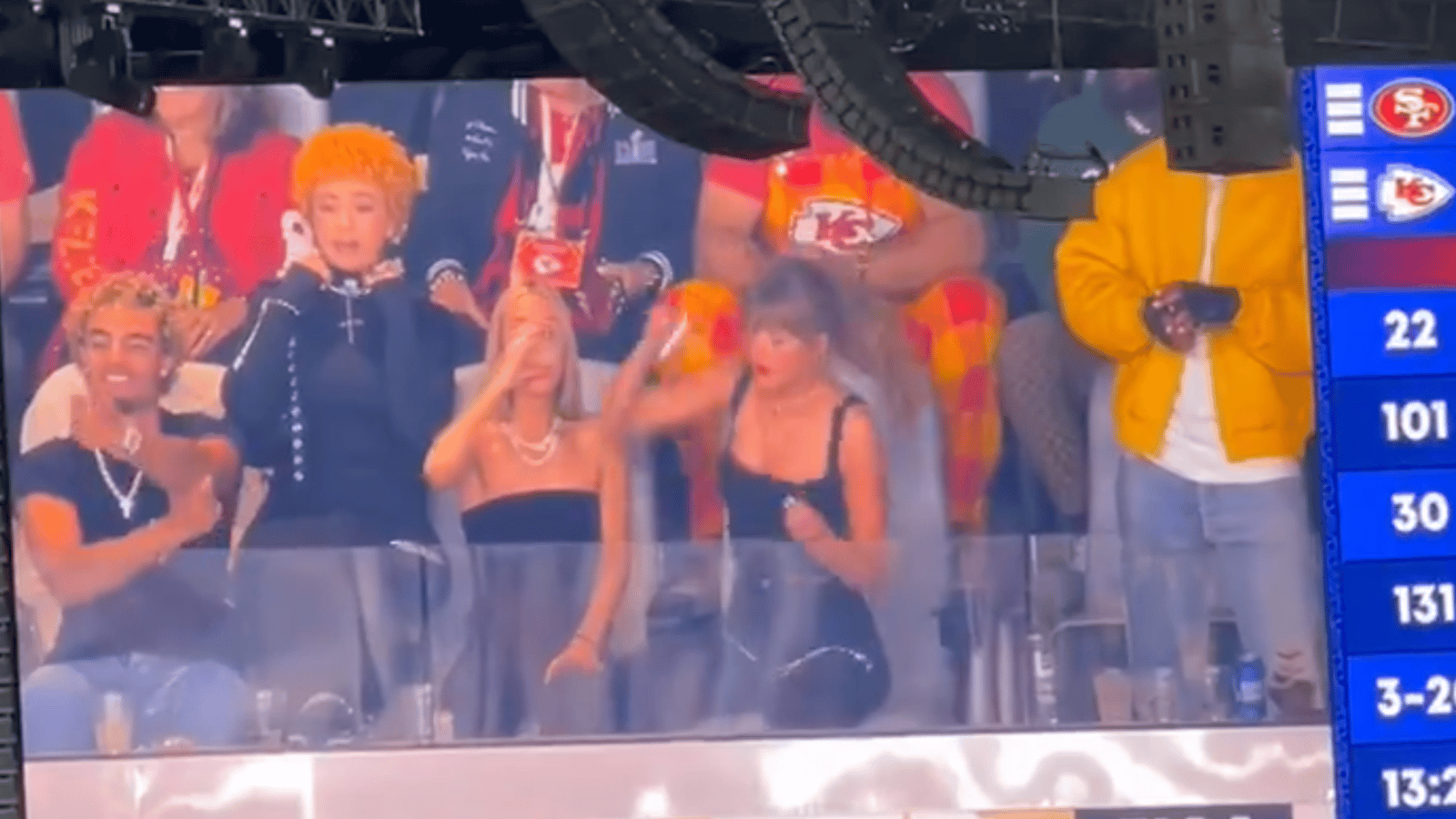 Fans BOO Taylor Swift as she chugs a beer