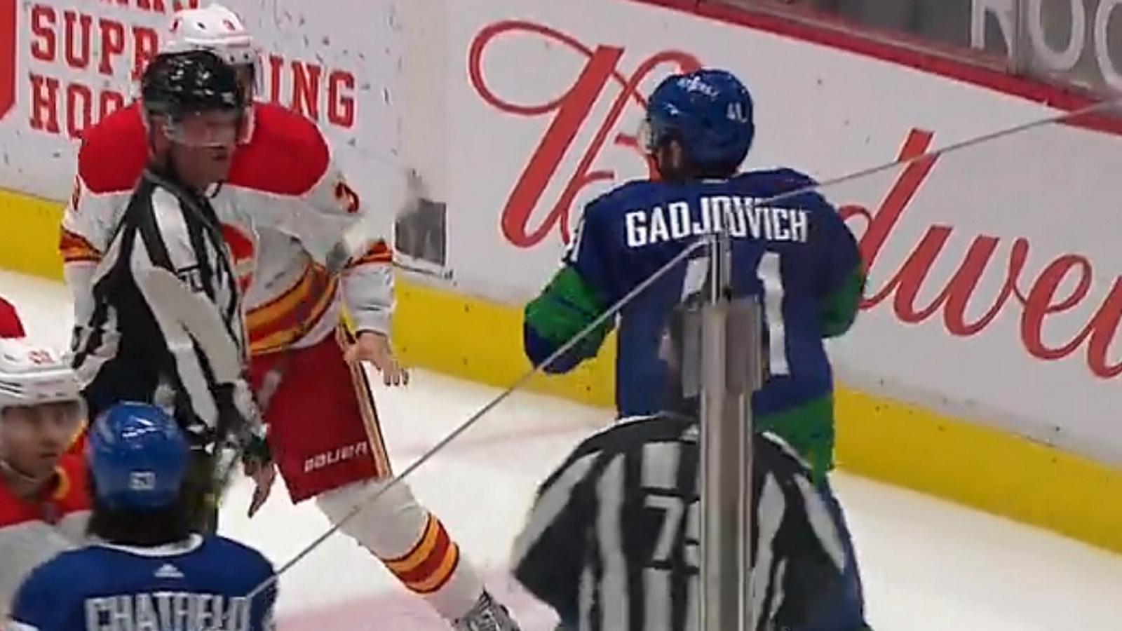 Canucks rookie Jonah Gadjovich drops the gloves in his first career NHL game.