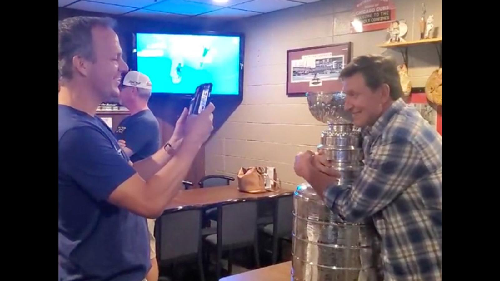 Gretzky is reunited with the Stanley Cup at Lightning's party