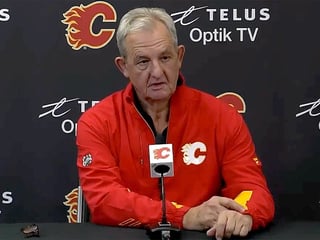 Darryl Sutter called into meeting with Flames GM Brad Treliving