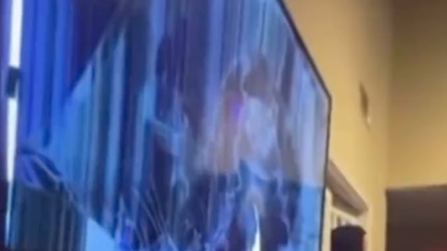 MUST SEE: Cowboys fan destroys television after playoff loss! 